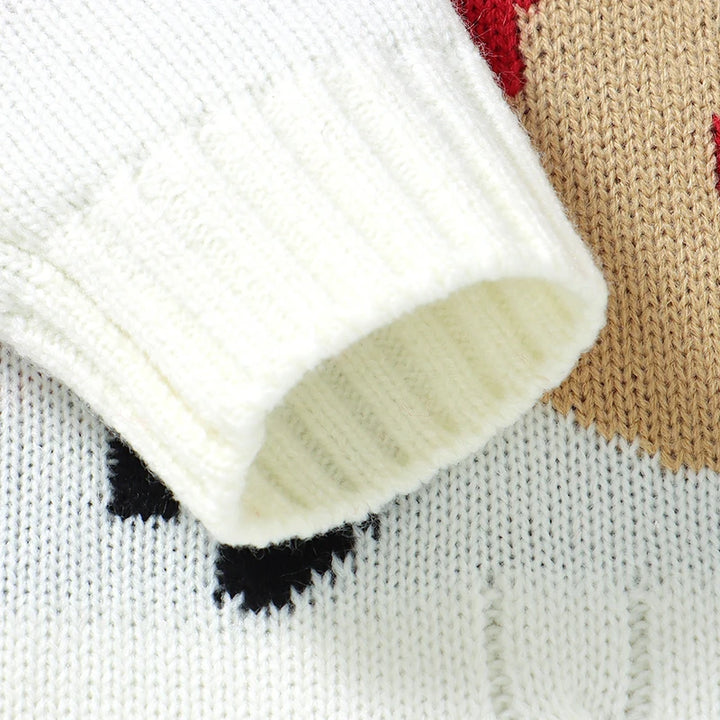 Détail de la combinaison à manches longues pour garçons et filles avec motif tricoté.