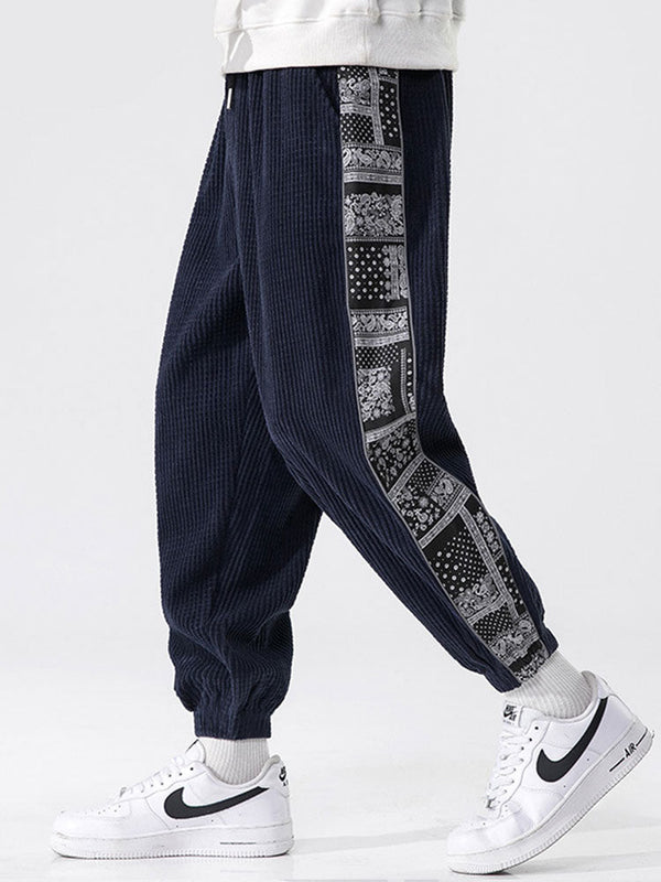 Pantalones de panel con estampado de paisley de pana